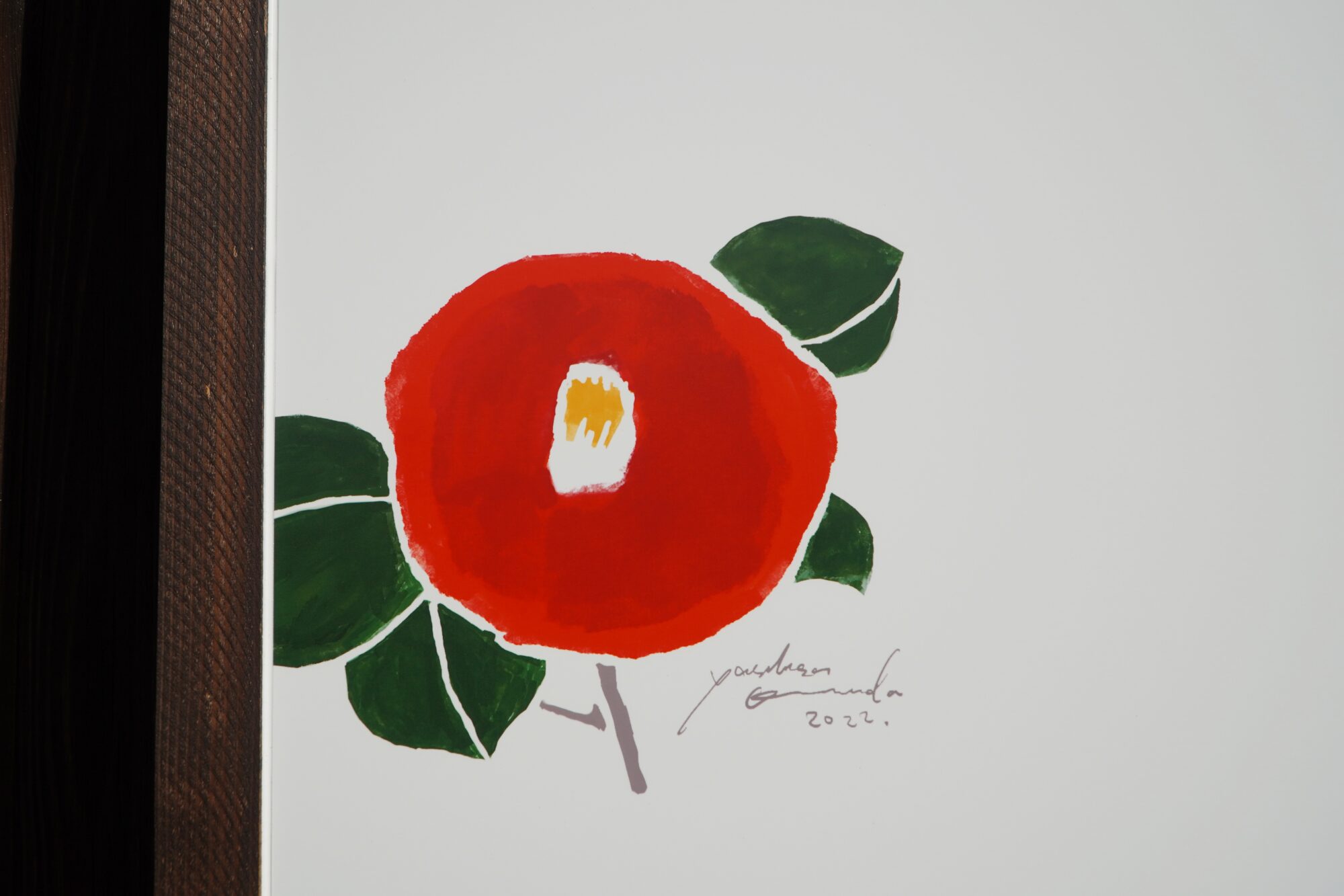 店のロゴに使われている椿の絵