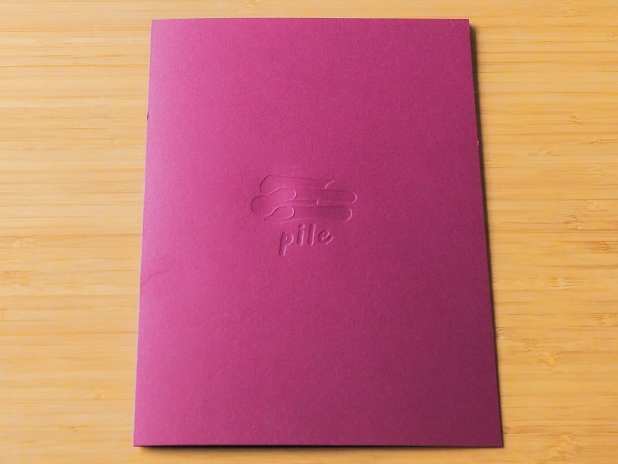 The cover of the pile menu features the store name and logo