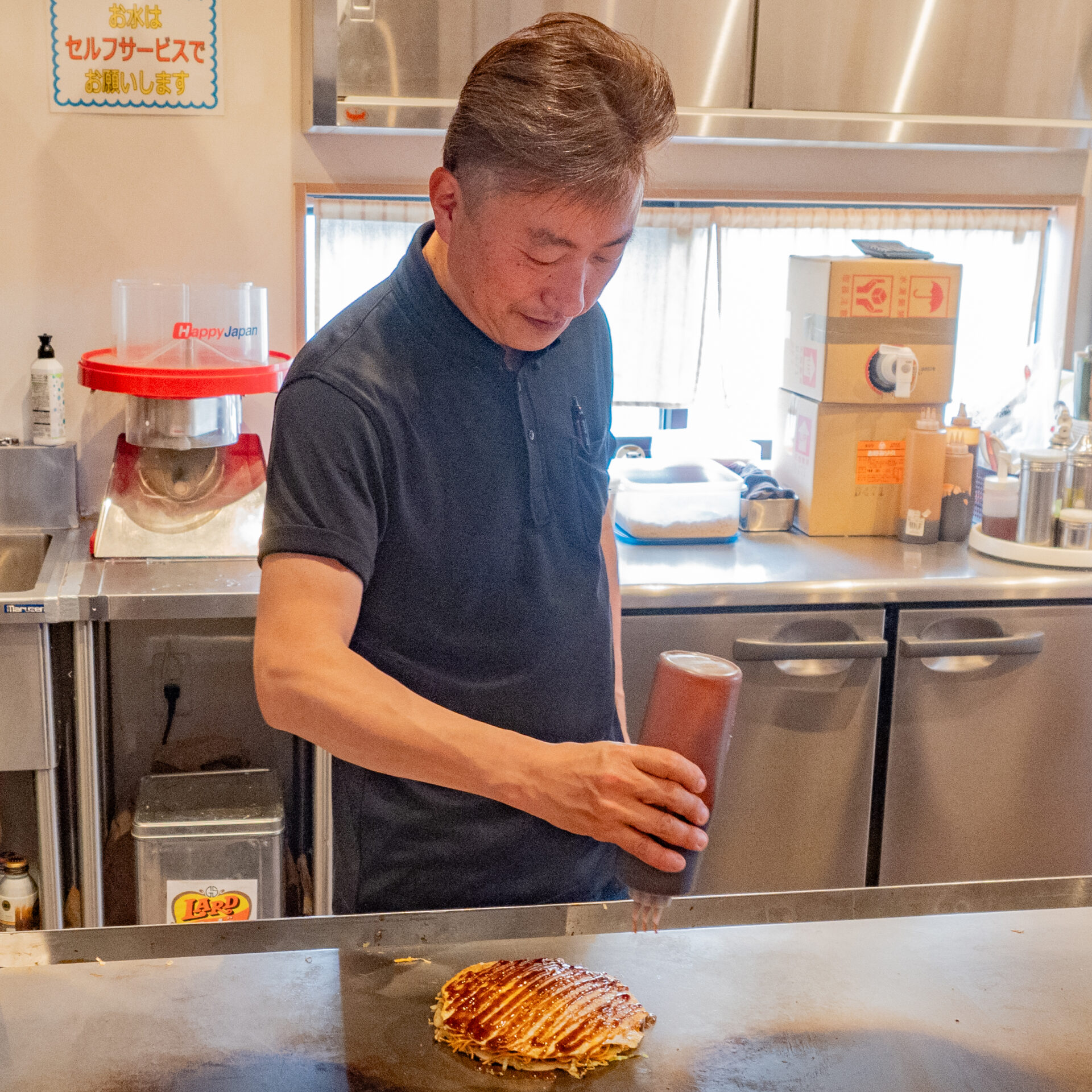 熱誠まるでん：田村周 店主