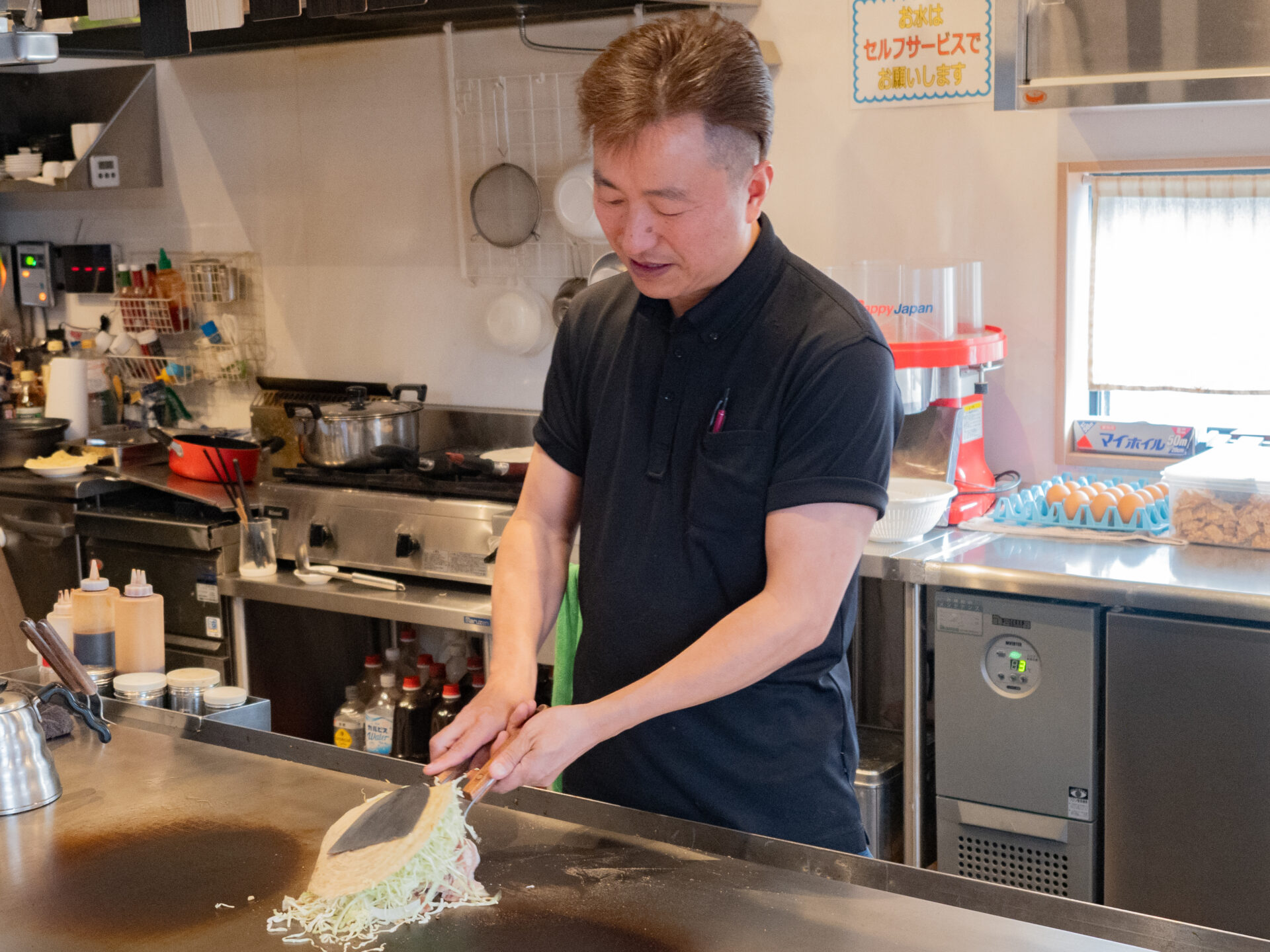熱誠まるでん：田村周 店主
