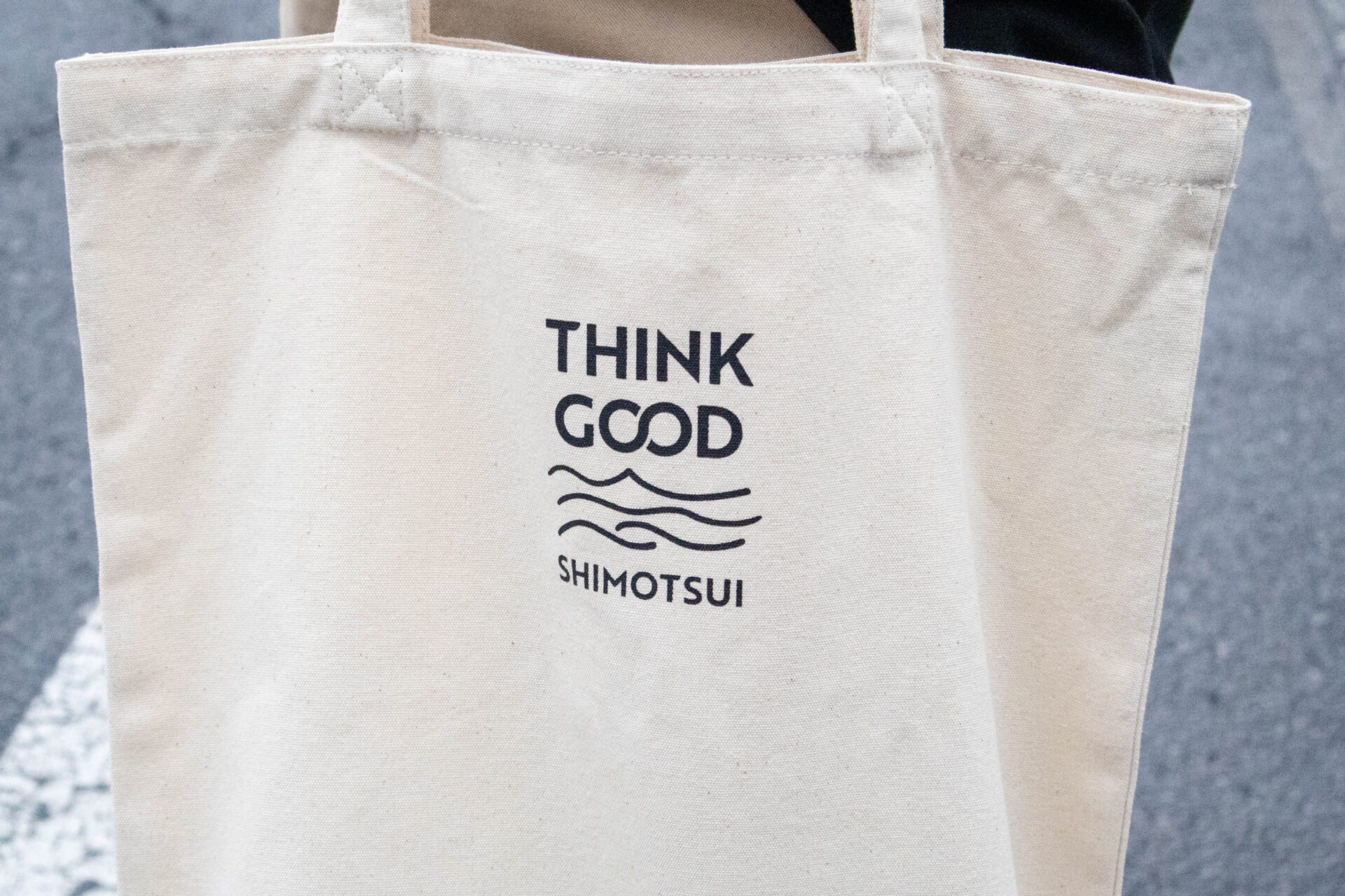 「THINK GOOD SHIMOTSUI」のロゴマーク