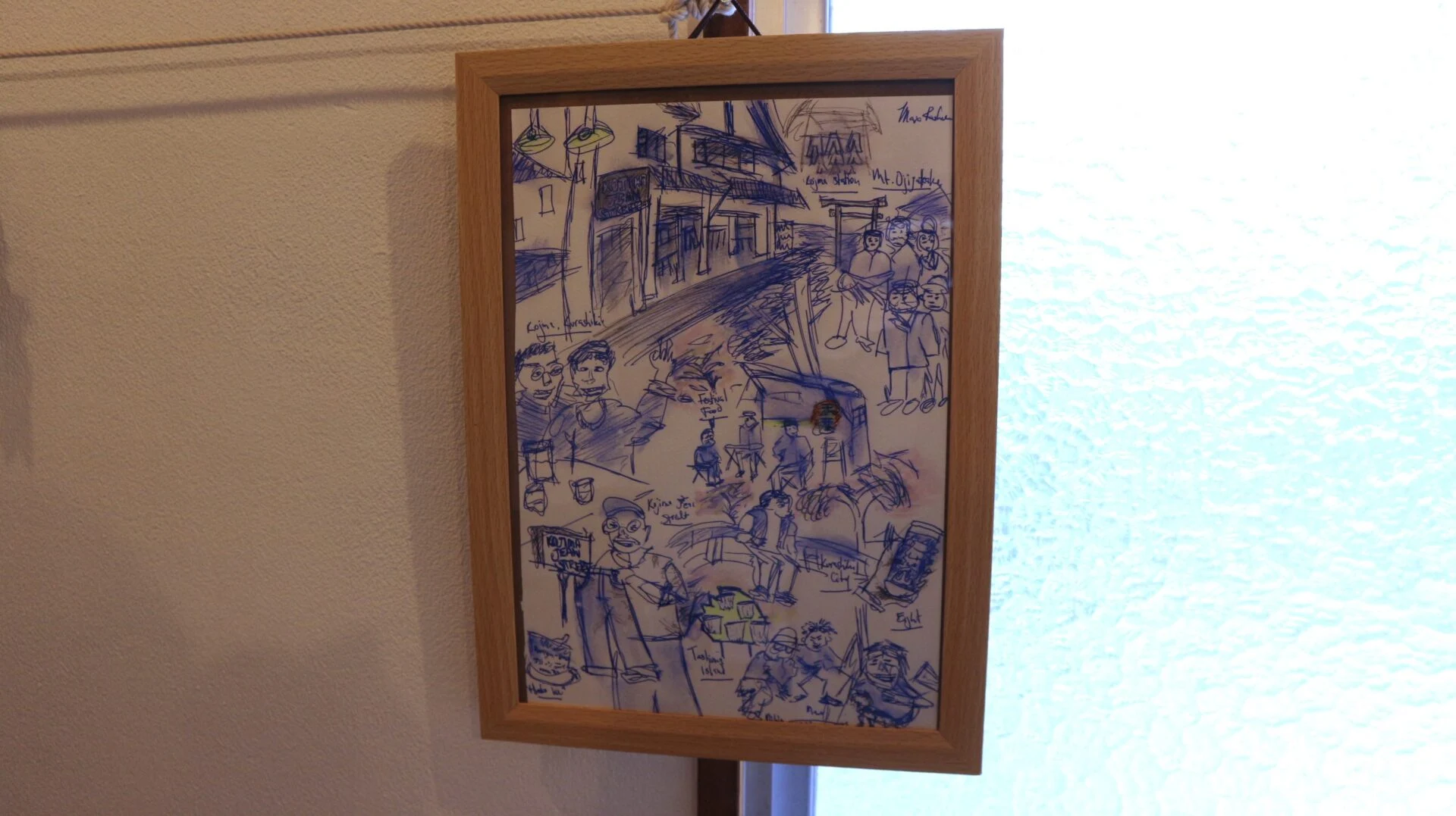 宿泊者からのプレゼント。児島で過ごした日々を描いた絵