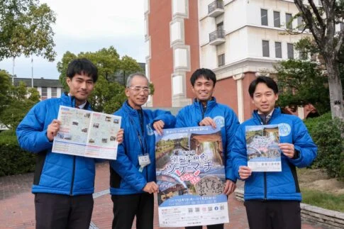 担当者とポスター