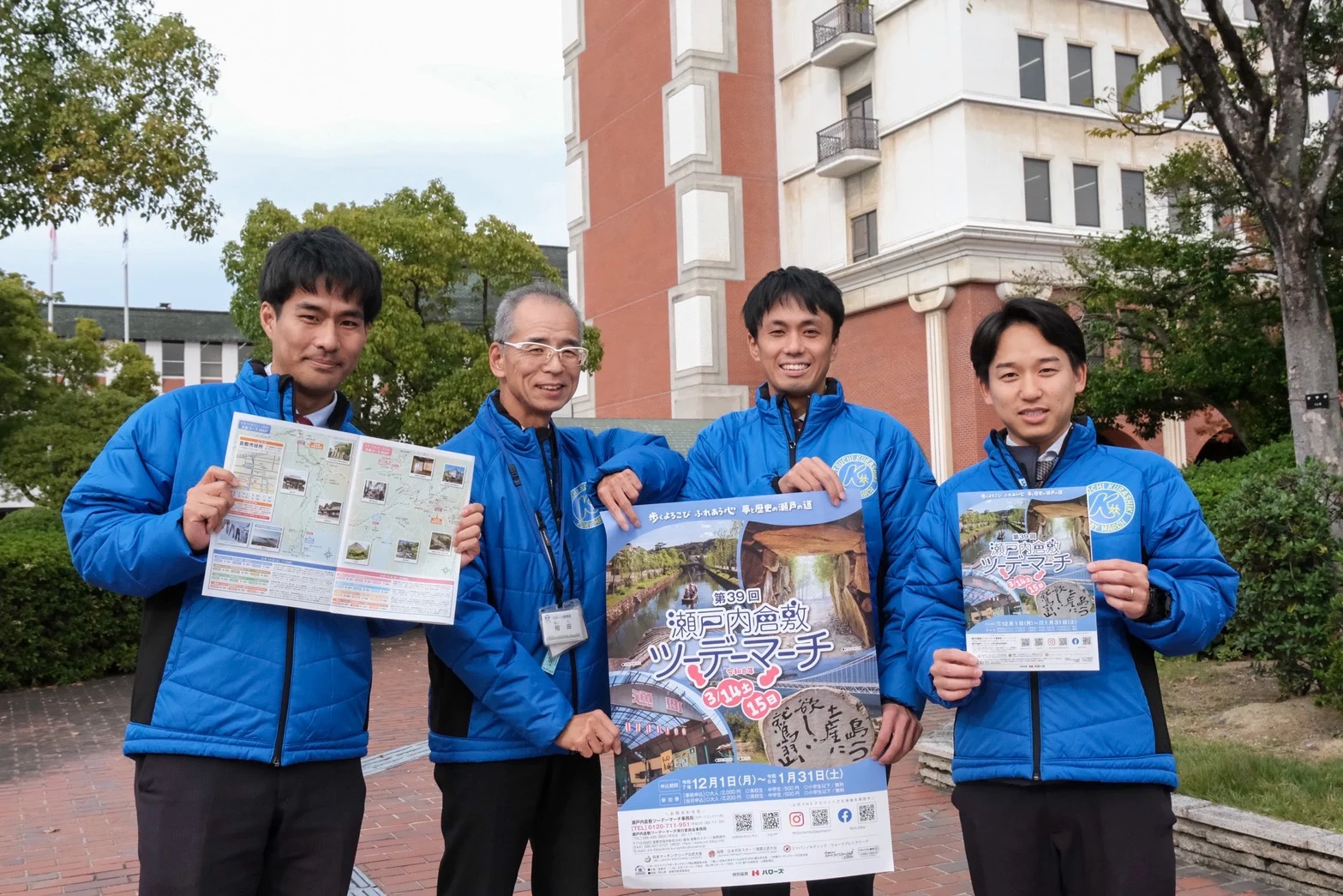 担当者とポスター