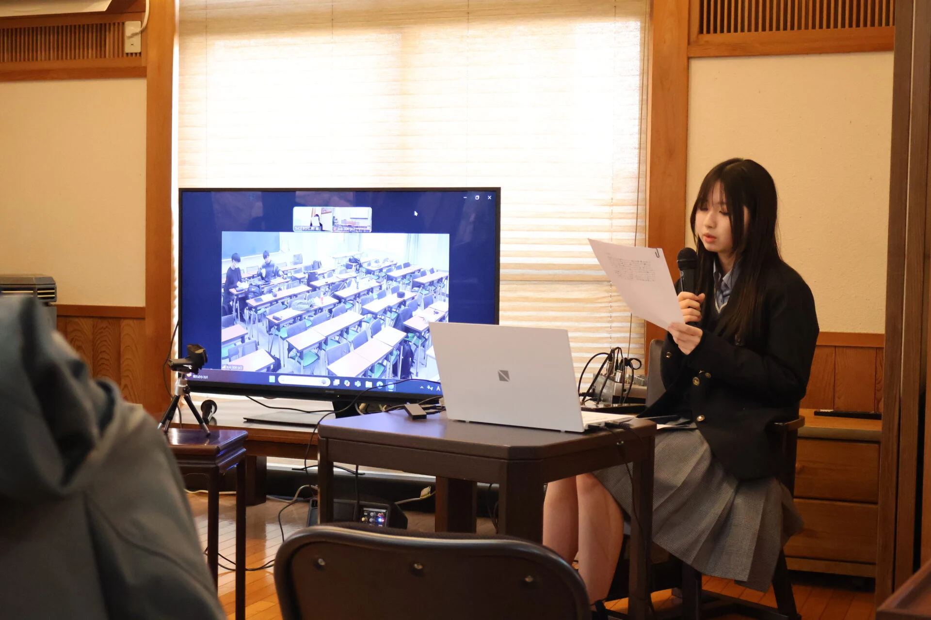 井上正貴さんの聞き書きを発表しているようす