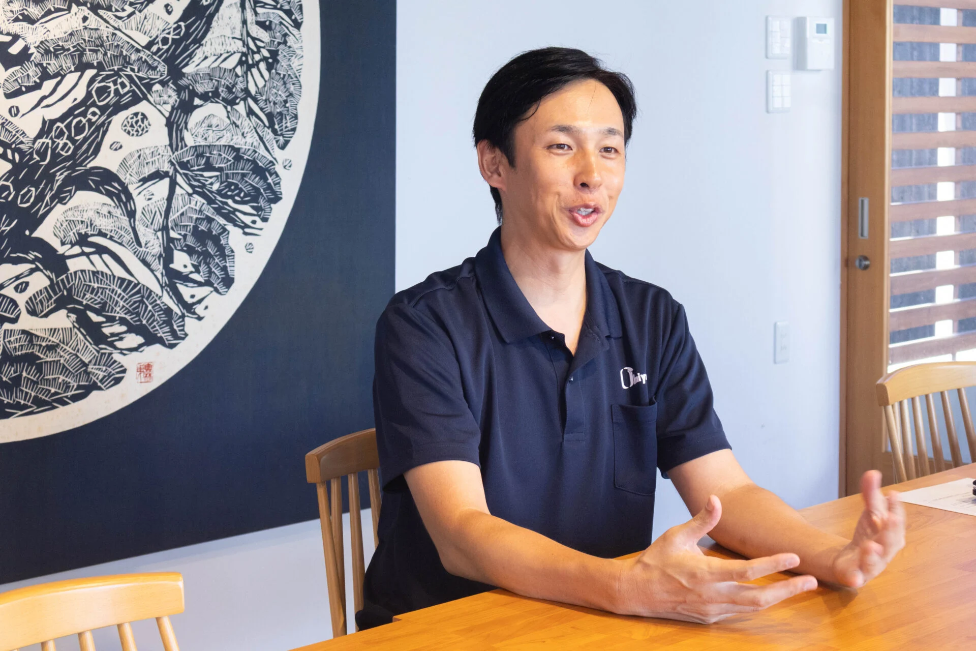 取材を受ける髙田さん