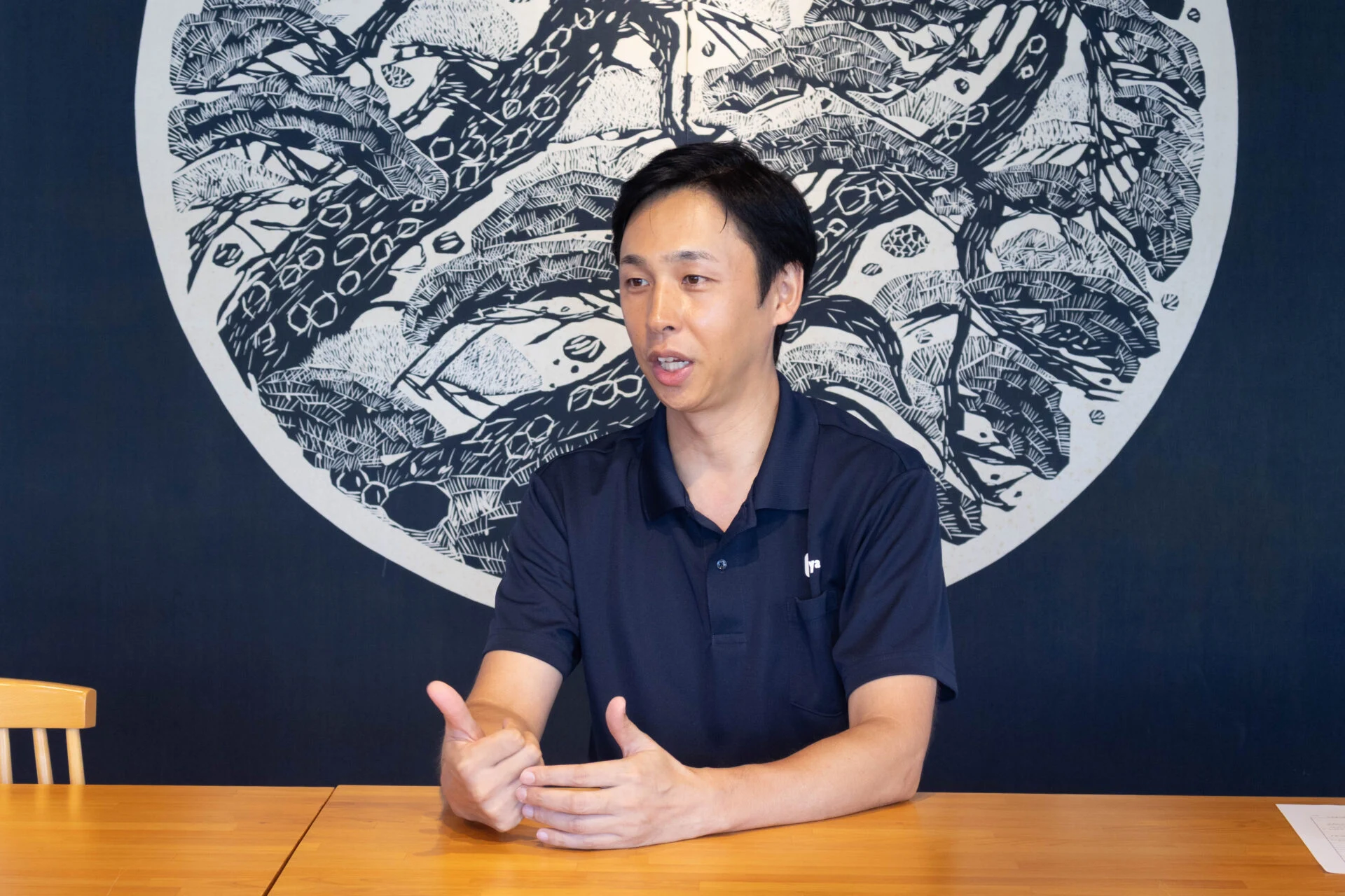 取材を受ける髙田さん