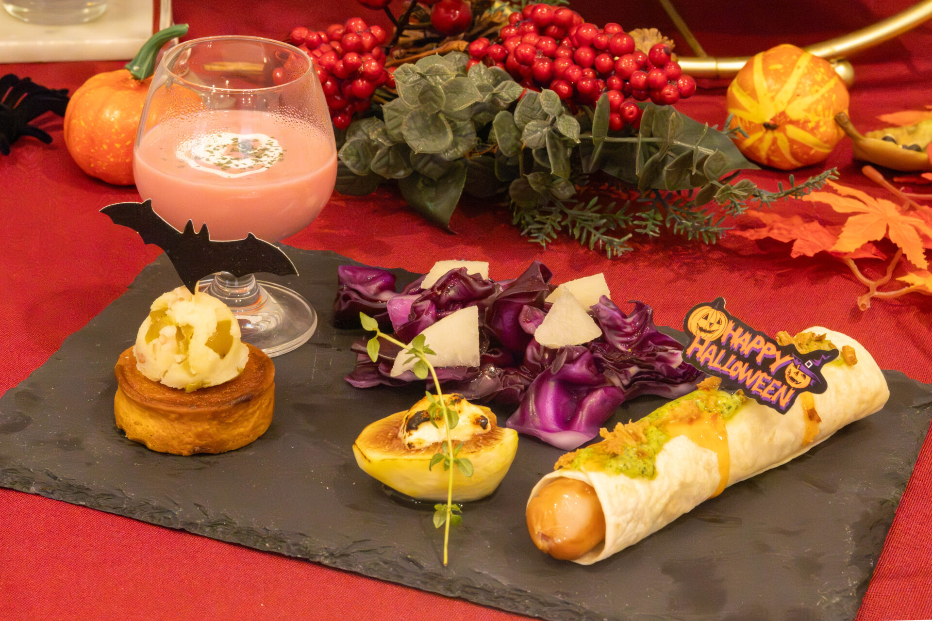 Savories decorated for Halloween and a pink drink