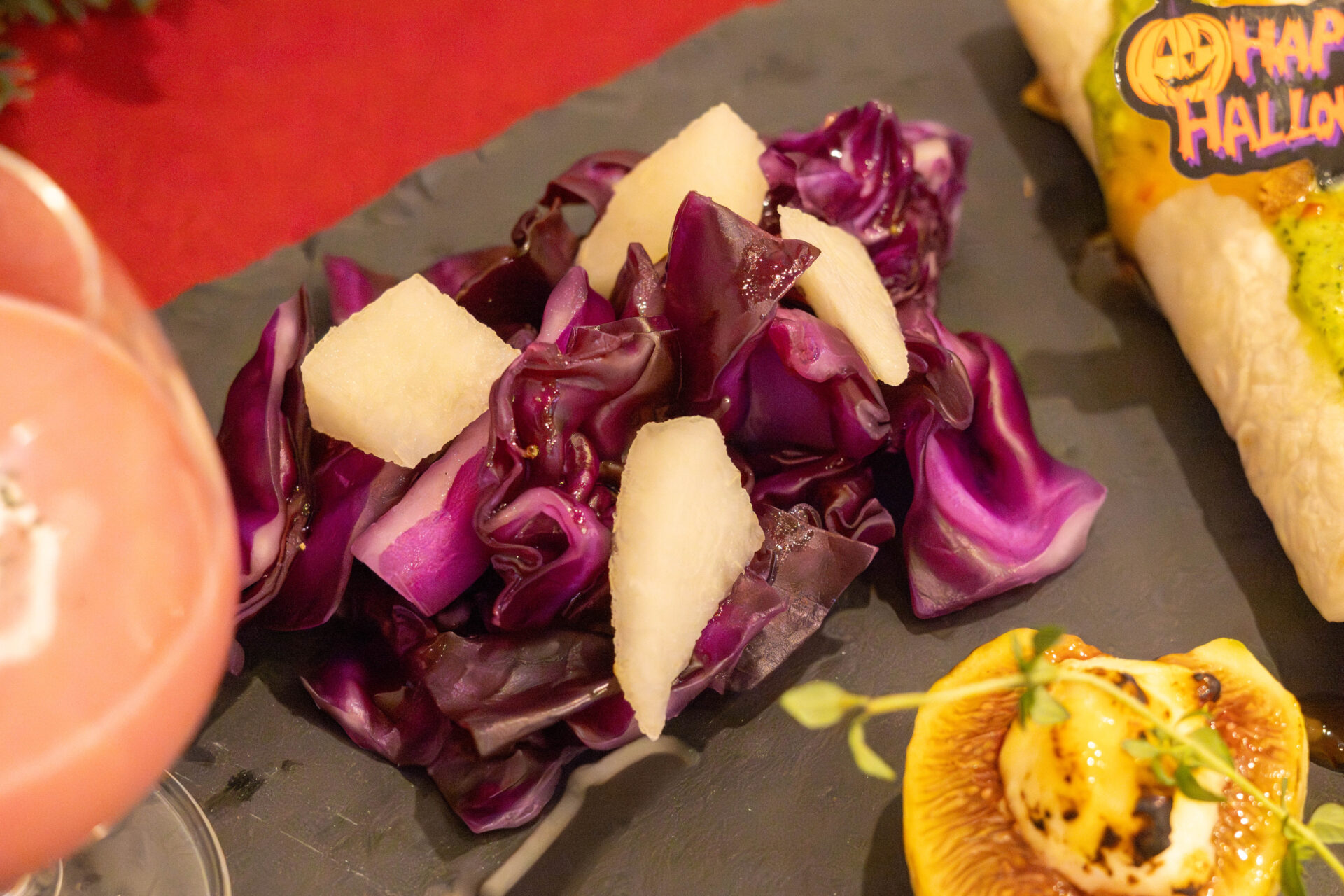 Perfect as a palate cleanser, marinated pears and purple cabbage deli-style. The crunchy texture is enjoyable.